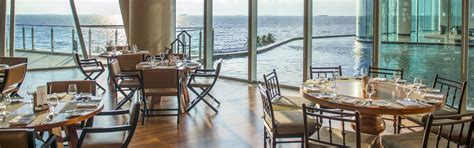 brasserie conrad|Al fresco dinner overlooking the bay .